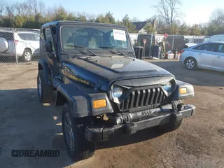 2006 Jeep Wrangler Sport with VIN 1J4FA49SX6P733671, listed as a IAAI auction lot 41779611 with 189,701 mi miles and . Bid and sale history available at carsss.com. Image 1.
