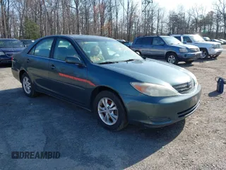 2004 Toyota Camry LE with VIN 4T1BF32K04U074276, listed as a IAAI auction lot 41940050 with 266,420 mi miles. Bid and sale history available at carsss.com. Image 1.