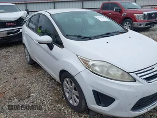 2012 Ford Fiesta SE with VIN 3FADP4BJ0CM220742, listed as a IAAI auction lot 42207303 with 175,875 mi miles and . Bid and sale history available at DreamBid. Image 6.