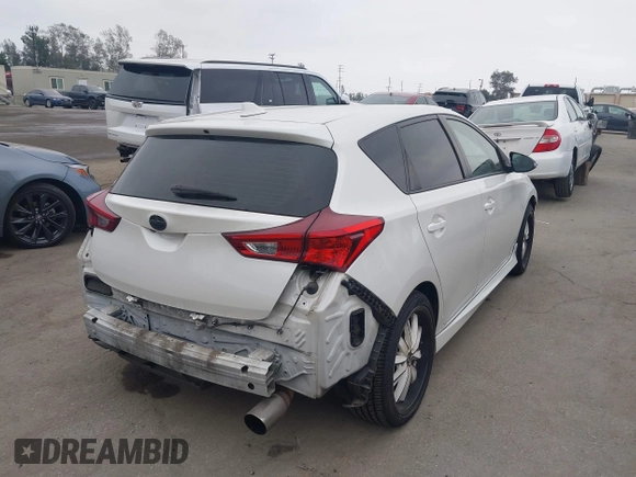 2016 Scion iM with VIN JTNKARJE1GJ516789, listed as a IAAI auction lot 42034498 with 132,796 mi miles. Bid and sale history available at carsss.com. Image 4.