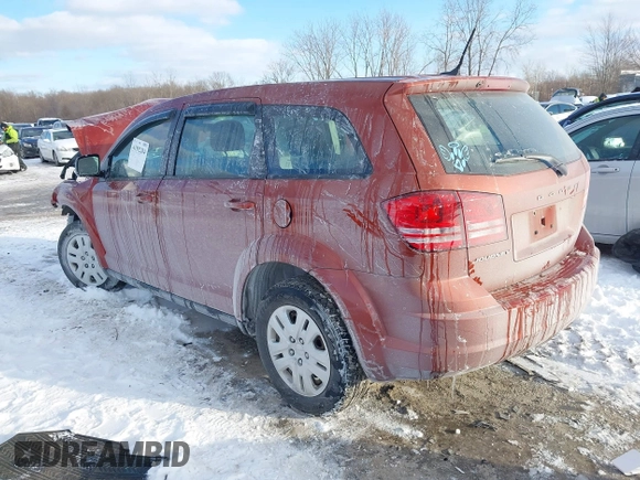 2014 Dodge Journey SE with VIN 3C4PDCAB0ET164105, listed as a IAAI auction lot 41592204 with 133,883 mi miles and . Bid and sale history available at carsss.com. Image 3.