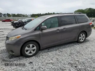 2011 Toyota Sienna LE AAS with VIN 5TDKK3DC7BS017421, listed as a Copart auction lot 58873505 with 127,709 mi miles and Clean title. Bid and sale history available at DreamBid. Image 1.