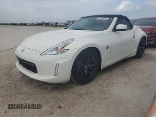 2016 Nissan 370Z Touring z VIN JN1AZ4FH7GM910698, wystawiony jako Copart lot #76703564 z przebiegiem 5660 mil mil oraz Nie do naprawy. Historia ofert i sprzedaży dostępna na DreamBid. Obrazek 1.