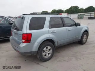 2008 Mazda Tribute Sport with VIN 4F2CZ02Z88KM16490, listed as a IAAI auction lot 41931310 with 118,176 mi miles. Bid and sale history available at carsss.com. Image 4.
