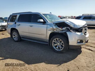2017 GMC Yukon SLT with VIN 1GKS2BKC9HR345688, listed as a Copart auction lot 52303075 with 122,969 mi miles and Salvage Title. Bid and sale history available at carsss.com. Image 4.