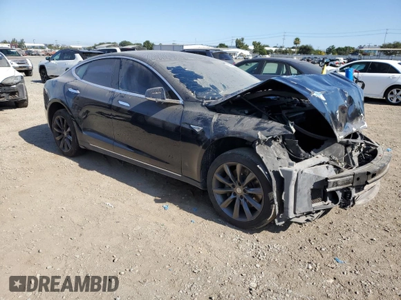 2014 Tesla Model S 60 with VIN 5YJSA1H13EFP38425, listed as a Copart auction lot 63686205 with 183,968 mi miles and Salvage title. Bid and sale history available at DreamBid. Image 4.