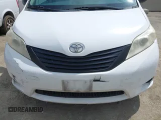 2011 Toyota Sienna with VIN 5TDZK3DCXBS011806, listed as a IAAI auction lot 41999946 with 219,907 mi miles. Bid and sale history available at carsss.com. Image 6.