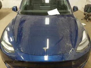 2021 Tesla Model Y Long Range with VIN 5YJYGDEE2MF185945, listed as a IAAI auction lot 41599029 with 53,815 mi miles and . Bid and sale history available at DreamBid. Image 10.