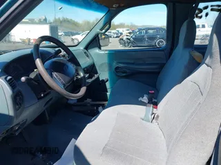 1997 Ford F-150 z VIN 1FTDX1768VNA88478, wystawiony jako IAAI lot #42080621 z przebiegiem 159 160 mil mil oraz . Historia ofert i sprzedaży dostępna na DreamBid. Obrazek 5.