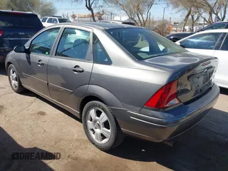 2003 Ford Focus SE with VIN 1FAFP34353W228000, listed as a IAAI auction lot 41682503 with 107,968 mi miles and . Bid and sale history available at carsss.com. Image 3.