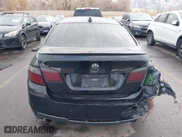 2015 BMW 5 Series 535i with VIN WBA5B1C51FG125924, listed as a IAAI auction lot 41060431 with 102,957 mi miles and . Bid and sale history available at carsss.com. Image 16.