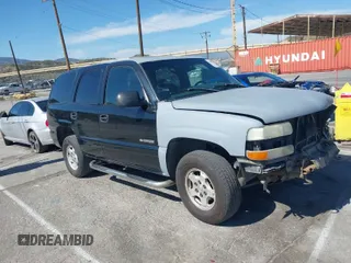 2001 Chevrolet Tahoe LT with VIN 1GNEC13T31R122882, listed as a IAAI auction lot 41999271 with 211,687 mi miles. Bid and sale history available at carsss.com. Image 1.