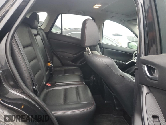 2013 Mazda CX-5 Grand Touring with VIN JM3KE4DE8D0161586, listed as a Copart auction lot 52641145 with 134,290 mi miles and Salvage Title. Bid and sale history available at carsss.com. Image 10.