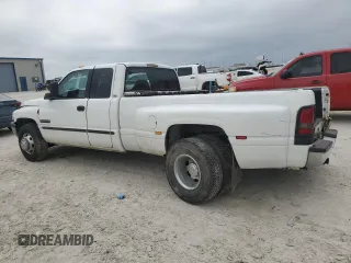 2001 Dodge Ram 3500 with VIN 1B7MC33771J257977, listed as a Copart auction lot 57947454 with 329,593 mi miles and Salvage Title. Bid and sale history available at carsss.com. Image 2.