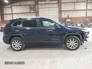 2015 Jeep Cherokee Limited with VIN 1C4PJMDB4FW775065, listed as a IAAI auction lot 42044247 with 125,131 mi miles and . Bid and sale history available at DreamBid. Image 14.