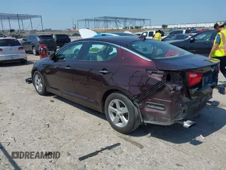 2014 Kia Optima LX with VIN 5XXGM4A70EG273483, listed as a IAAI auction lot 42402765 with 129,770 mi miles and . Bid and sale history available at DreamBid. Image 3.