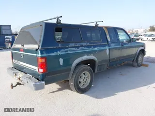 1995 Dodge Dakota with VIN 1B7GL23X3SS134423, listed as a IAAI auction lot 41767788 with 189,517 mi miles. Bid and sale history available at carsss.com. Image 4.