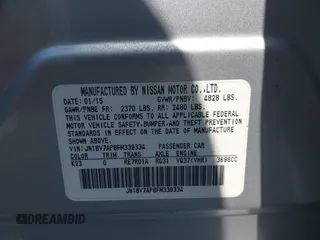 2015 Infiniti Q50 Premium with VIN JN1BV7AP8FM339334, listed as a IAAI auction lot 41956950 with 99,945 mi miles. Bid and sale history available at carsss.com. Image 9.