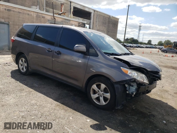 2019 Toyota Sienna L with VIN 5TDZZ3DC8KS006907, listed as a Copart auction lot 70310274 with 73,234 mi miles and Salvage Title. Bid and sale history available at carsss.com. Image 4.