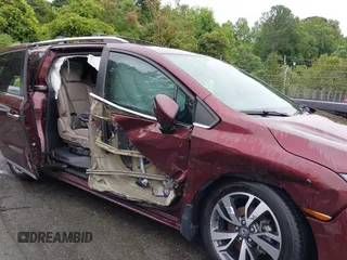 2021 Honda Odyssey Touring with VIN 5FNRL6H88MB006938, listed as a IAAI auction lot 42367022 with 63,280 mi miles and . Bid and sale history available at DreamBid. Image 12.