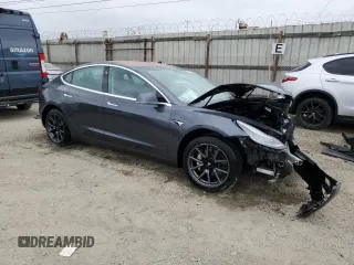 2018 Tesla Model 3 Long Range Battery z VIN 5YJ3E1EA7JF123805, wystawiony jako Copart lot #56034325 z przebiegiem 90 249 mil mil oraz Szkoda całkowita • Salvage title. Historia ofert i sprzedaży dostępna na DreamBid. Obrazek 4.