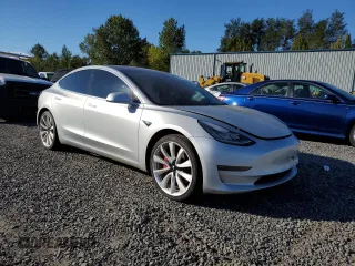 2018 Tesla Model 3 Long Range Battery with VIN 5YJ3E1EB4JF074295, listed as a Copart auction lot 74775384 with 83,515 mi miles and Salvage Title. Bid and sale history available at DreamBid. Image 4.