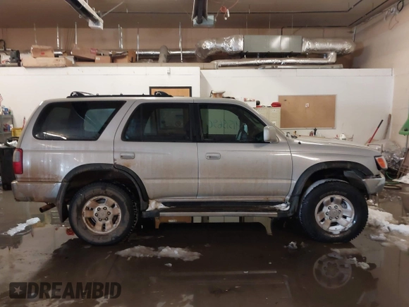 1998 Toyota 4Runner SR5 with VIN JT3HN86R1W0183463, listed as a IAAI auction lot 41515690 with 299,355 mi miles and . Bid and sale history available at DreamBid. Image 13.