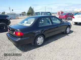1999 Toyota Corolla VE z VIN 1NXBR12E9XZ205120, wystawiony jako IAAI lot #42216177 z przebiegiem 175 508 mil mil oraz . Historia ofert i sprzedaży dostępna na DreamBid. Obrazek 4.