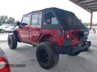 2012 Jeep Wrangler Unlimited Sport z VIN 1C4BJWDG3CL207291, wystawiony jako IAAI lot #42211454 z przebiegiem 110 864 mil mil oraz . Historia ofert i sprzedaży dostępna na DreamBid. Obrazek 3.