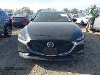 2023 Mazda 3 S Select with VIN 3MZBPABM2PM373880, listed as a IAAI auction lot 41702395 with 20,637 mi miles and . Bid and sale history available at DreamBid. Image 12.