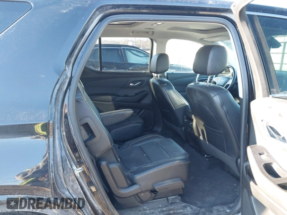 2018 Chevrolet Traverse Premier z VIN 1GNEVJKW5JJ174261, wystawiony jako IAAI lot #41656906 z przebiegiem 101 908 mil mil oraz . Historia ofert i sprzedaży dostępna na DreamBid. Obrazek 8.