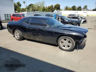 2013 Dodge Challenger R/T with VIN 2C3CDYBT7DH515879, listed as a Copart auction lot 53133345 with 150,152 mi miles and Salvage Title. Bid and sale history available at carsss.com. Image 4.