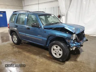 2004 Jeep Liberty Sport with VIN 1J4GK48K04W127981, listed as a Copart auction lot 51804135 with 166,710 mi miles and Salvage Title. Bid and sale history available at DreamBid. Image 4.