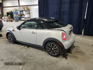 2013 MINI Cooper Coupe with VIN WMWSX1C50DT507354, listed as a Copart auction lot 48070765 with 98,830 mi miles and Salvage Title. Bid and sale history available at carsss.com. Image 2.