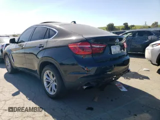 2015 BMW X6 xDrive50i with VIN 5UXKU6C53F0F94035, listed as a Copart auction lot 49604204 with 122,910 mi miles and Salvage Title. Bid and sale history available at carsss.com. Image 2.