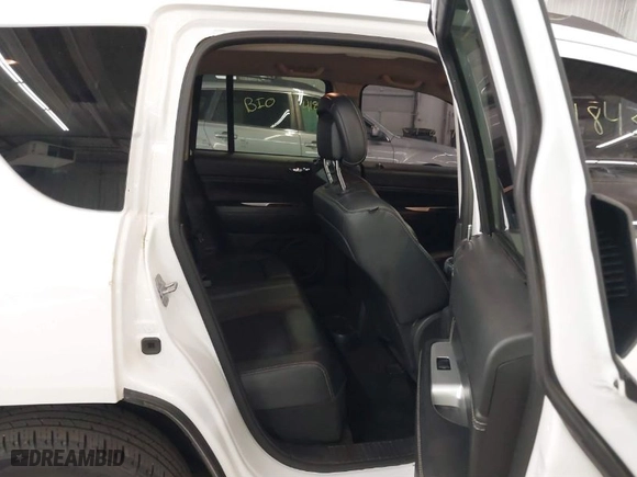 2014 Jeep Compass Latitude with VIN 1C4NJDEB1ED623034, listed as a IAAI auction lot 41843519 with 118,220 mi miles. Bid and sale history available at carsss.com. Image 8.
