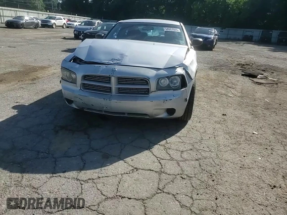 2006 Dodge Charger z VIN 2B3KA43G86H528185, wystawiony jako Copart lot #58007605 z przebiegiem 266 197 mil mil oraz Szkoda całkowita • Salvage title. Historia ofert i sprzedaży dostępna na DreamBid. Obrazek 13.