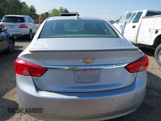 2015 Chevrolet Impala LT z VIN 2G1125S35F9213472, wystawiony jako IAAI lot #41924702 z przebiegiem 124 656 mil mil oraz . Historia ofert i sprzedaży dostępna na DreamBid. Obrazek 16.