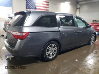 2012 Honda Odyssey EX-L with VIN 5FNRL5H69CB143572, listed as a Copart auction lot 48614255 with 114,490 mi miles and Salvage Title. Bid and sale history available at carsss.com. Image 3.