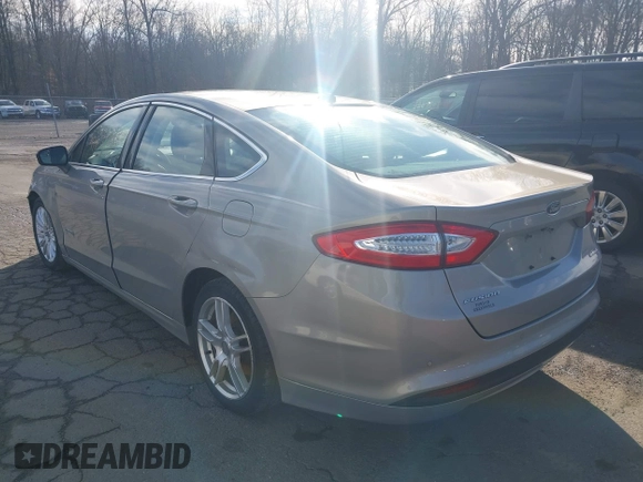 2015 Ford Fusion SE Hybrid with VIN 3FA6P0LUXFR133979, listed as a IAAI auction lot 41831288 with 143,738 mi miles. Bid and sale history available at carsss.com. Image 3.