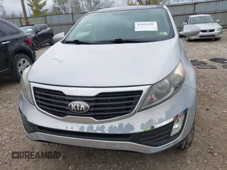 2013 Kia Sportage EX with VIN KNDPCCA22D7484936, listed as a IAAI auction lot 41921531 with 128,001 mi miles and . Bid and sale history available at DreamBid. Image 6.