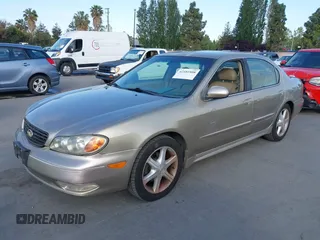 2004 Infiniti I35 with VIN JNKDA31A74T209228, listed as a IAAI auction lot 42181808 with 202,647 mi miles. Bid and sale history available at carsss.com. Image 2.