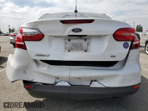 2016 Ford Focus SE with VIN 1FADP3F23GL362328, listed as a Copart auction lot 54898205 with 86,323 mi miles and Salvage title. Bid and sale history available at DreamBid. Image 6.