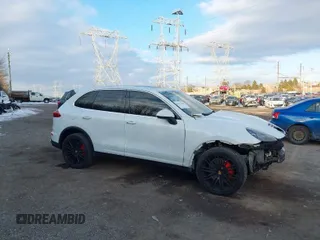 2018 Porsche Cayenne S with VIN WP1AB2A25JLA61000, listed as a IAAI auction lot 41432805 with 94,949 mi miles and . Bid and sale history available at DreamBid. Image 1.