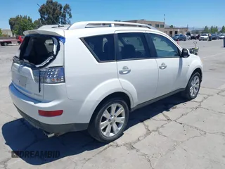 2007 Mitsubishi Outlander XLS z VIN JA4MT41X87Z022372, wystawiony jako IAAI lot #42342600 z przebiegiem 190 073 mil mil oraz . Historia ofert i sprzedaży dostępna na DreamBid. Obrazek 4.