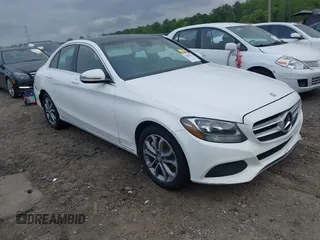 2016 Mercedes-Benz C 300 Luxury with VIN 55SWF4KB5GU121891, listed as a IAAI auction lot 42013113 with 105,472 mi miles and . Bid and sale history available at DreamBid. Image 1.