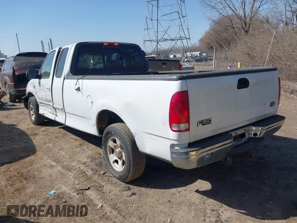 2003 Ford F-150 with VIN 2FTRX17L63CA31923, listed as a IAAI auction lot 41778818 with 107,600 mi miles and . Bid and sale history available at DreamBid. Image 3.