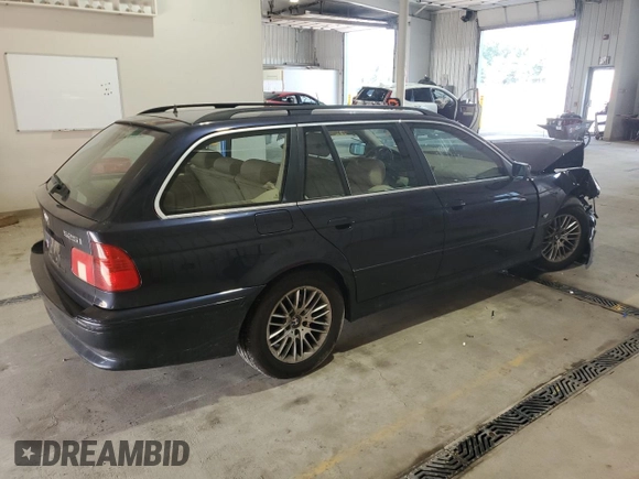 2001 BMW 5 Series 525i with VIN WBADS43421GD84986, listed as a Copart auction lot 64464735 with Not provided miles and Salvage title. Bid and sale history available at DreamBid. Image 3.