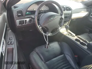 2002 Ford Thunderbird Hardtop Premium z VIN 1FAHP60A52Y122437, wystawiony jako Copart lot #73883244 z przebiegiem Nie podano mil oraz Nie do naprawy • Non repairable. Historia ofert i sprzedaży dostępna na DreamBid. Obrazek 8.