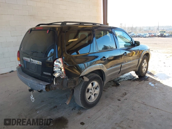 2002 Mazda Tribute LX with VIN 4F2CU08172KM58561, listed as a IAAI auction lot 41435407 with 141,908 mi miles and . Bid and sale history available at carsss.com. Image 4.